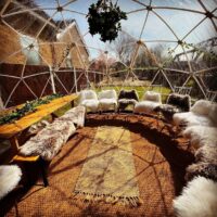 Boho rustic interior styling with faux furs inside igloo